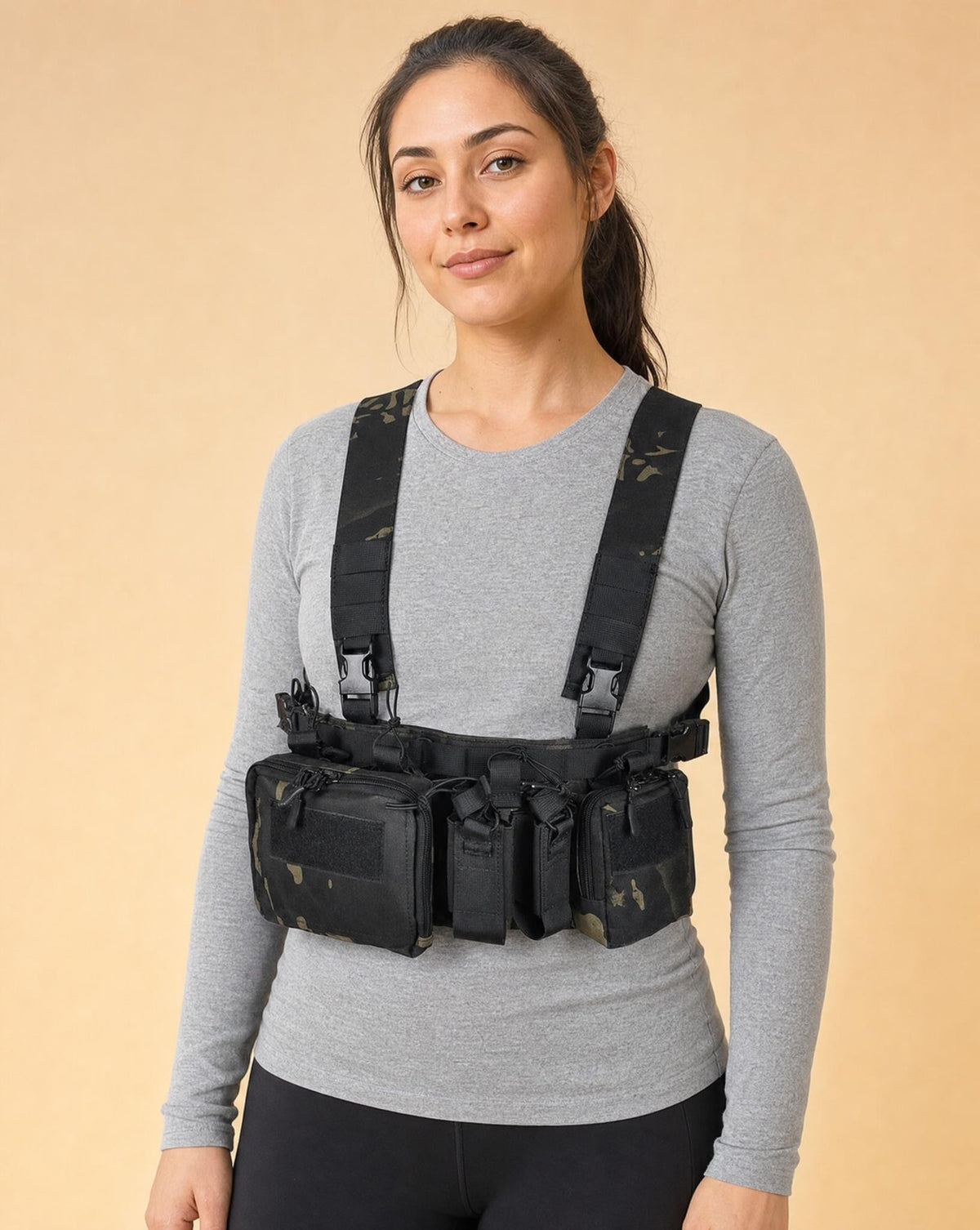 Tactical chest rig in Black Camo, worn by a woman